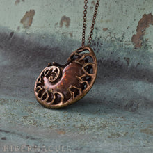 Load image into Gallery viewer, Ammonite Reliquary -- Red Opal Ammolite in Bronze or Silver | Hibernacula