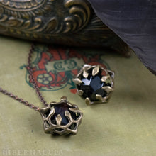 Load image into Gallery viewer, Unbound  -- Garnet Dodecahedron Caged in Bronze | Hibernacula