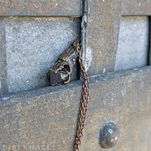 Load image into Gallery viewer, Magnetite Pendulum -- Raw Magnetite Crystal in Bronze or Silver | Hibernacula